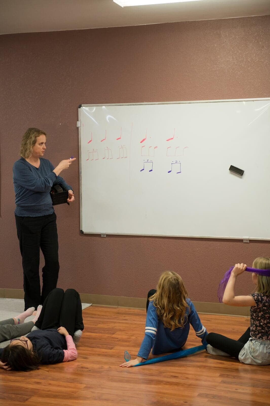 Children learning after movement in a Dalcroze class