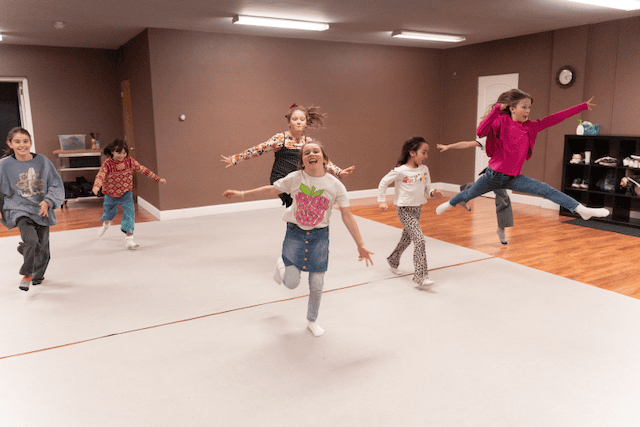Dalcroze Music Camp Movement Jumping Smiling Having Fun